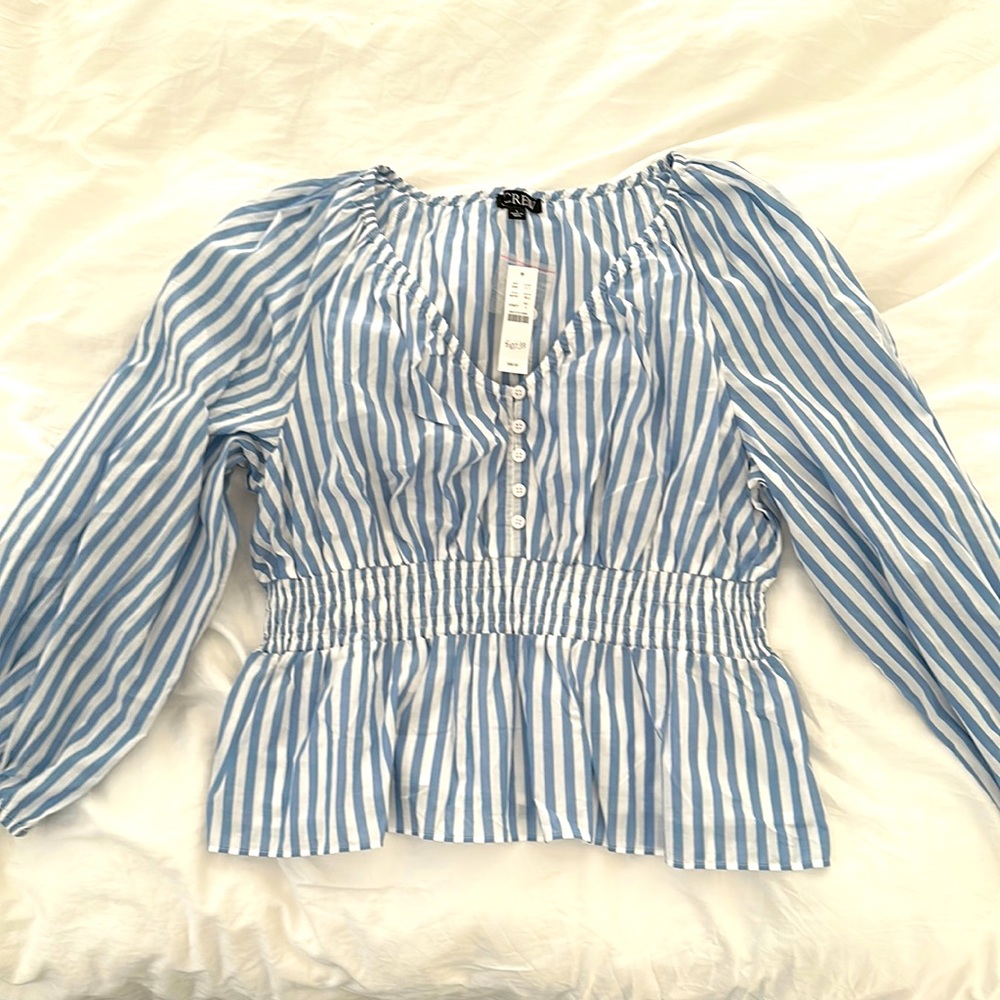 Cinched-waist button down striped v-neck blouse.